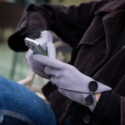 Women’s Touchscreen Velour-Lined Faux Suede Gloves With Contrast Trim And Bow -Dents womens faux suede gloves with bow grey 2